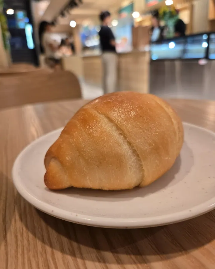 Fresh salt bread on a plate at Sora Bake & Tea Room Calgary