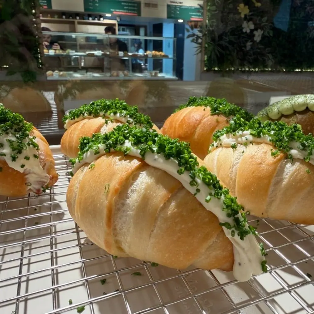 Salt bread topped with chive cream at Sora Bake & Tea Room Calgary
